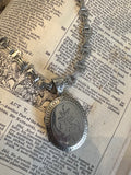 Locket on Chain. Antique silver Oval locket.